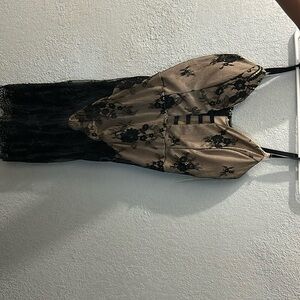 Black mesh dress with tan bodysuit